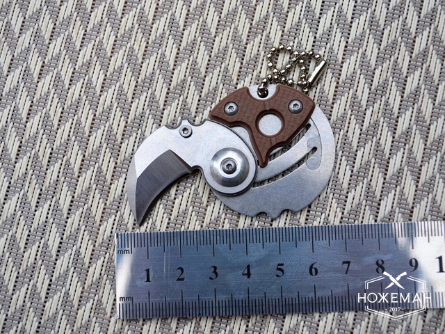 Нож-монета Serge Panchenko Coin Claw brown